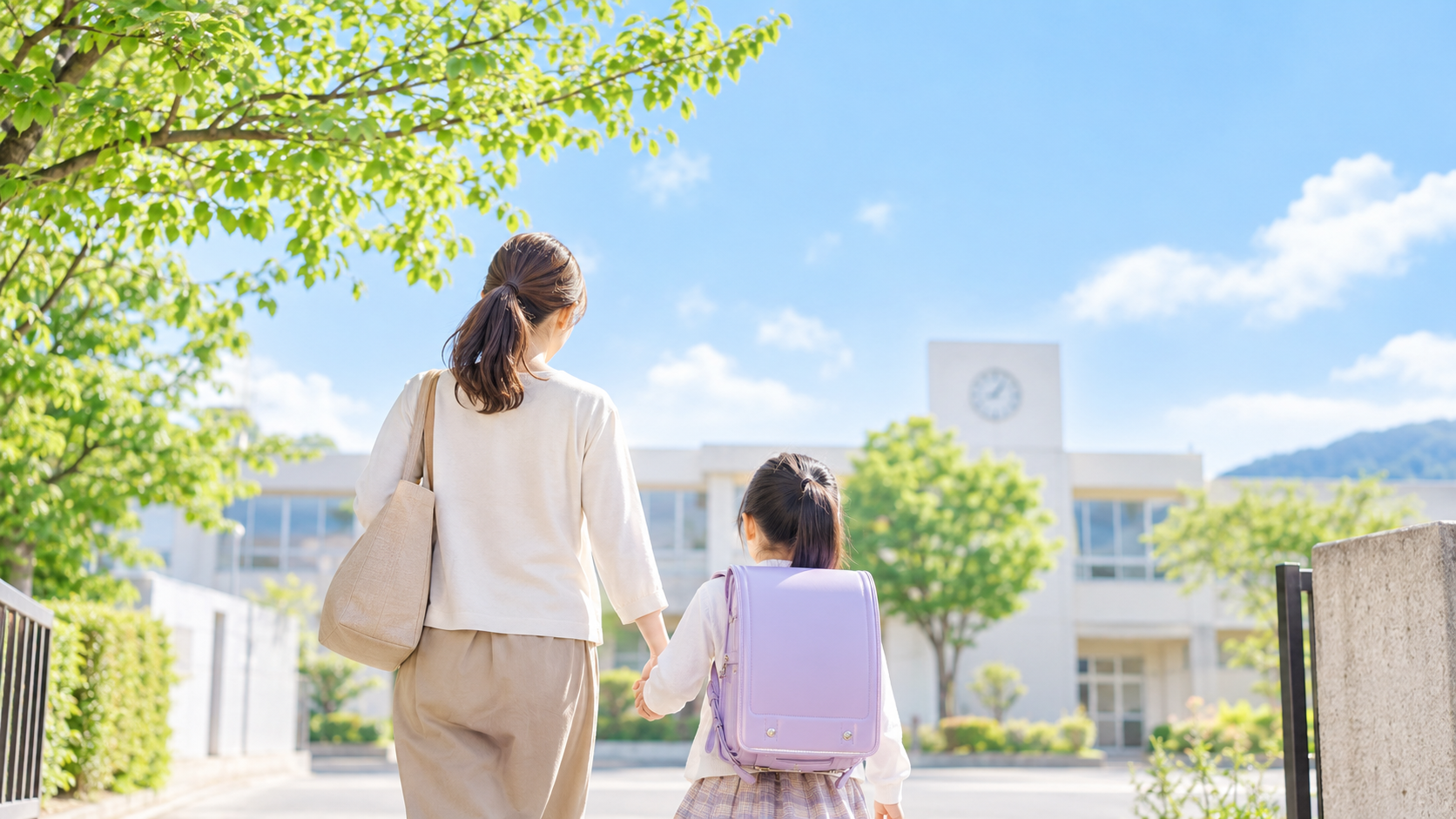 学校へ向かう親子のイメージ